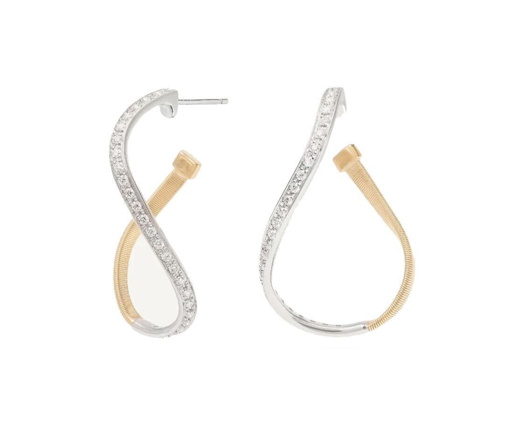 Subtle, elegant and full of finesse, these 18k yellow and white gold hoop earrings feature a striking twisted coil into an irregular infinity shaped hoop and embellished with 0.38 CTW of pavé diamonds. Perfect for adding a touch of light to any outfit.&nbsp;