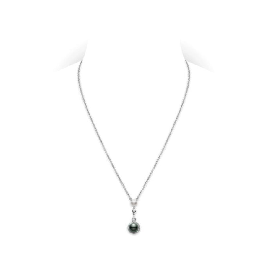 his pendant features a 6mm Akoya cultured pearls along with a 8mm Black South Sea cultured pearls with 0.17ct of diamond set in 18K white gold.